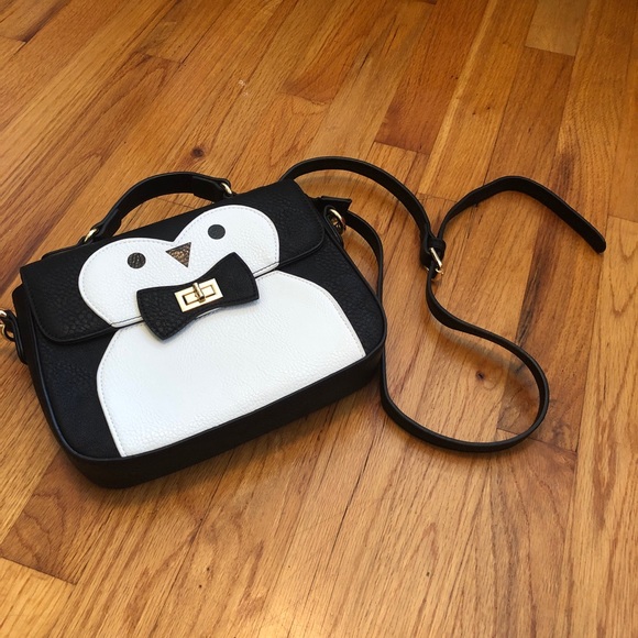 Charming Charlie Handbags - NWOT Charming Charlie penguin purse